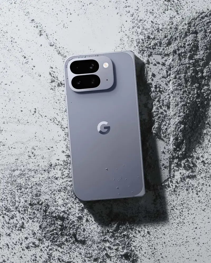 A Moonstone Pixel 10 Pro Fold lying in a pile of grey dust
