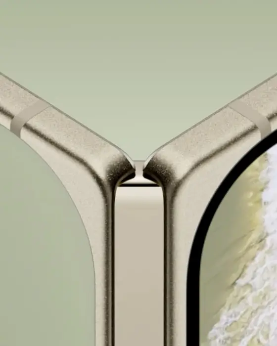 The hinge of an open Olive Pixel 11 Pro Fold up close, where the two halves meet