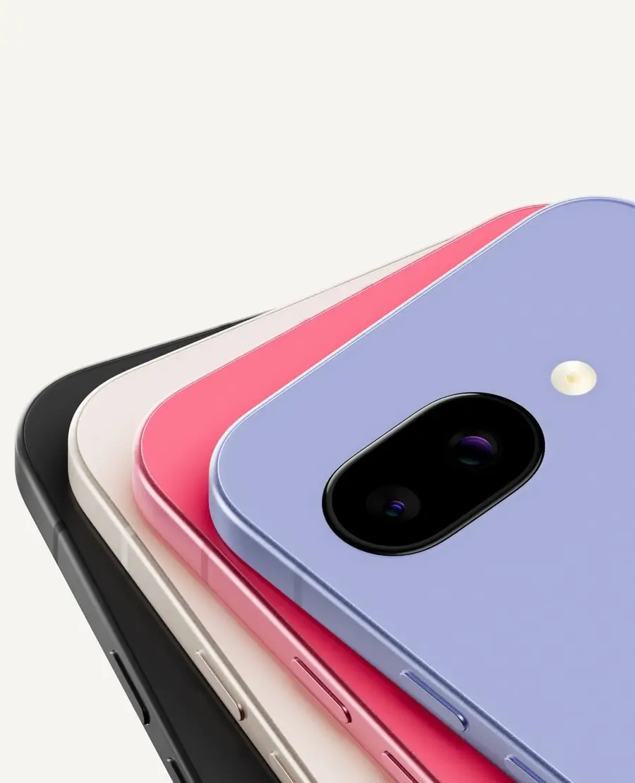 Pixel 9a phones in Obsidian, Porcelain, Peony and Iris fanned out on top of each other